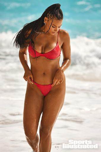 Marquita Pring was photographed by Ben Watts in Barbados. Swimsuit by Ark Swimwear. Earrings by Maria Tash and Pamela Love. Rings by Pamela Love.